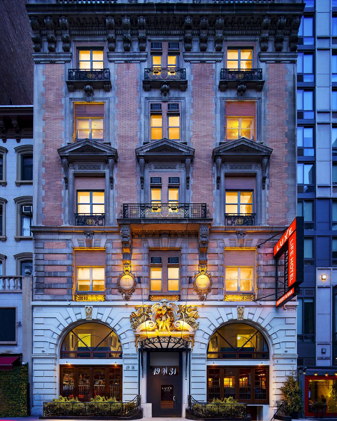 Life Hotel New York facade at dusk